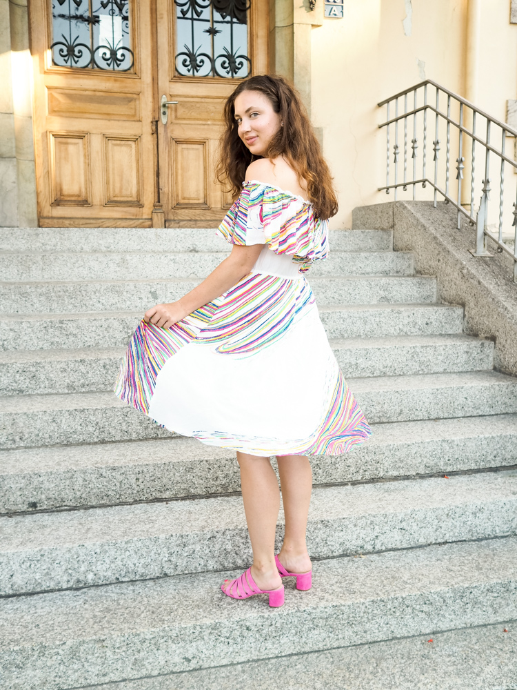 Cristina from The Brunette Nomad, Dallas fashion blogger living in Switzerland, shows you how she wears color by styling an off the shoulder dress with Loeffler Randall heels