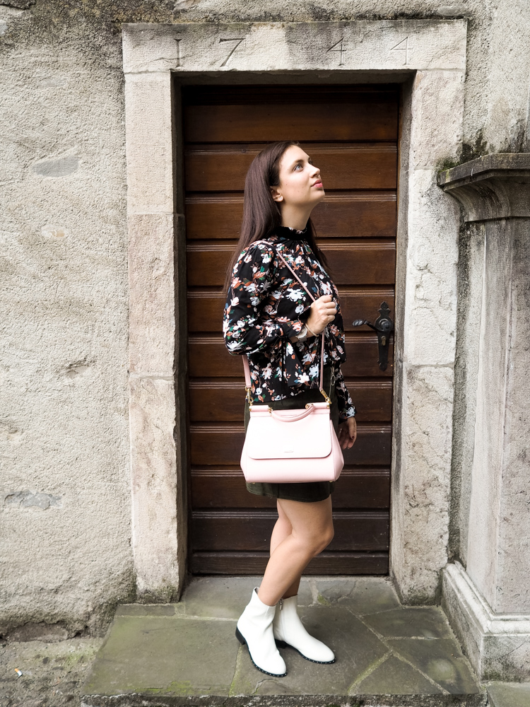 Cristina from The Brunette Nomad, Dallas fashion blogger living in Switzerland, shows how to wear white booties with winter florals