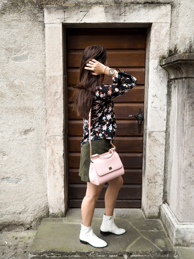 Cristina from The Brunette Nomad, Dallas fashion blogger living in Switzerland, shows how to wear white booties with winter florals