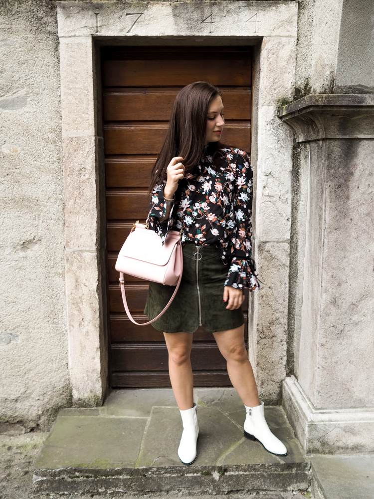 Cristina from The Brunette Nomad, Dallas fashion blogger living in Switzerland, shows how to wear white booties with winter florals