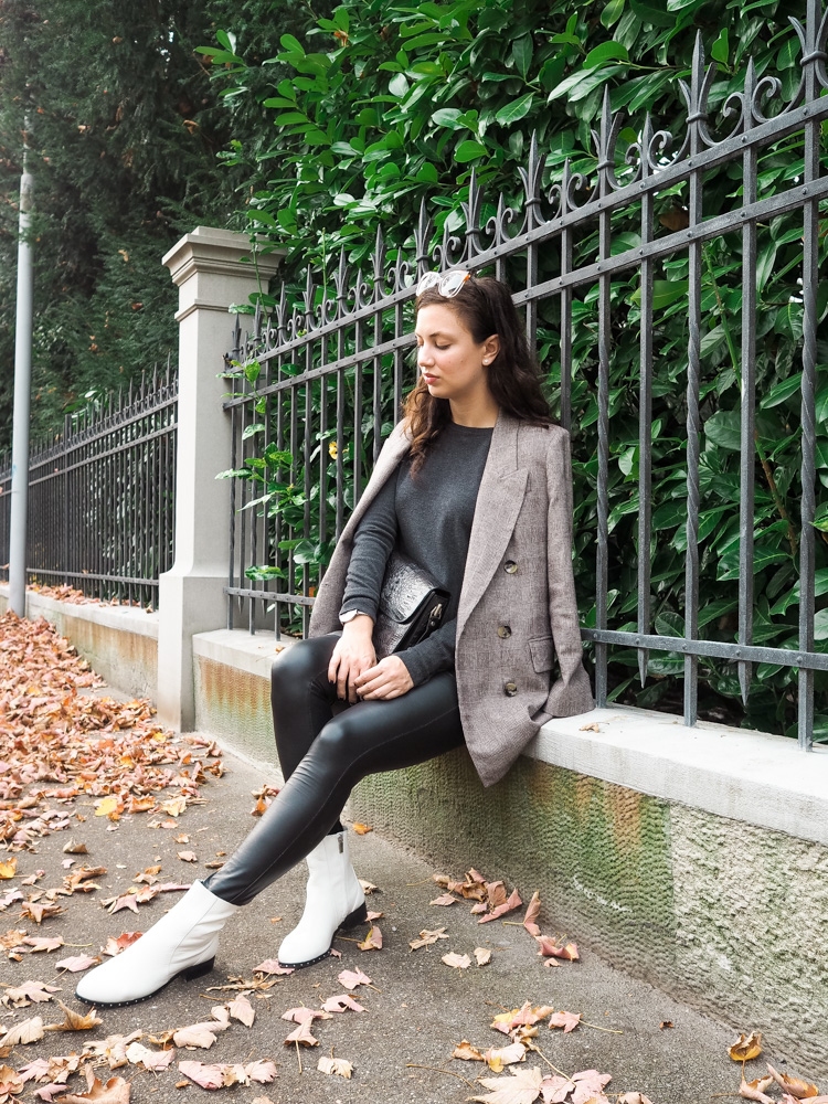 Cristina from The Brunette Nomad, Dallas fashion blogger living in Switzerland, is sharing her favorite leather leggings by Hue