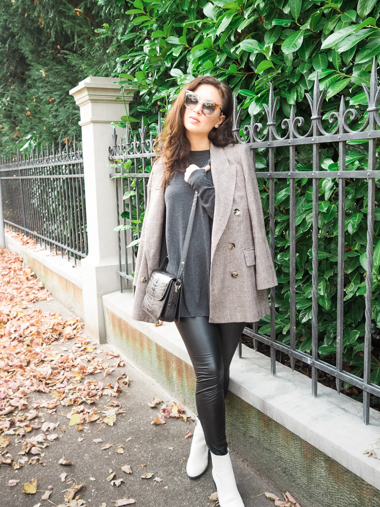 Cristina from The Brunette Nomad, Dallas fashion blogger living in Switzerland, is sharing her favorite leather leggings by Hue