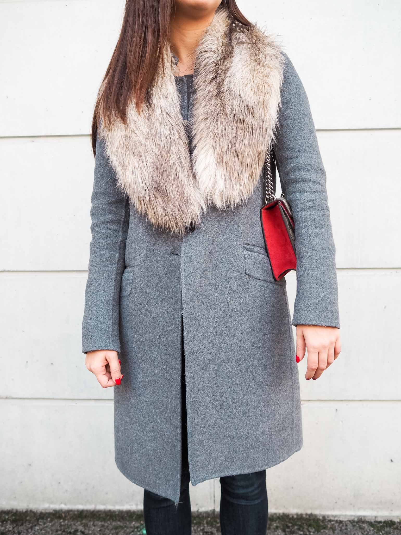 Fashion blogger is wearing a casual weekend style with faux fur