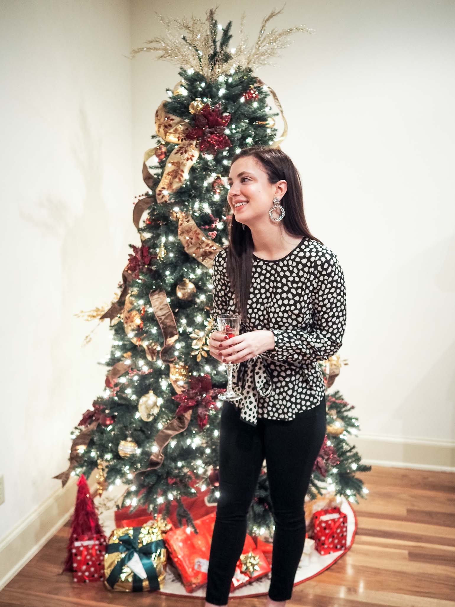 Cristina from The Brunette Nomad, Dallas fashion blogger, shares her casual holiday party look and two holiday cocktails that you need to serve for all of your holiday parties this season 