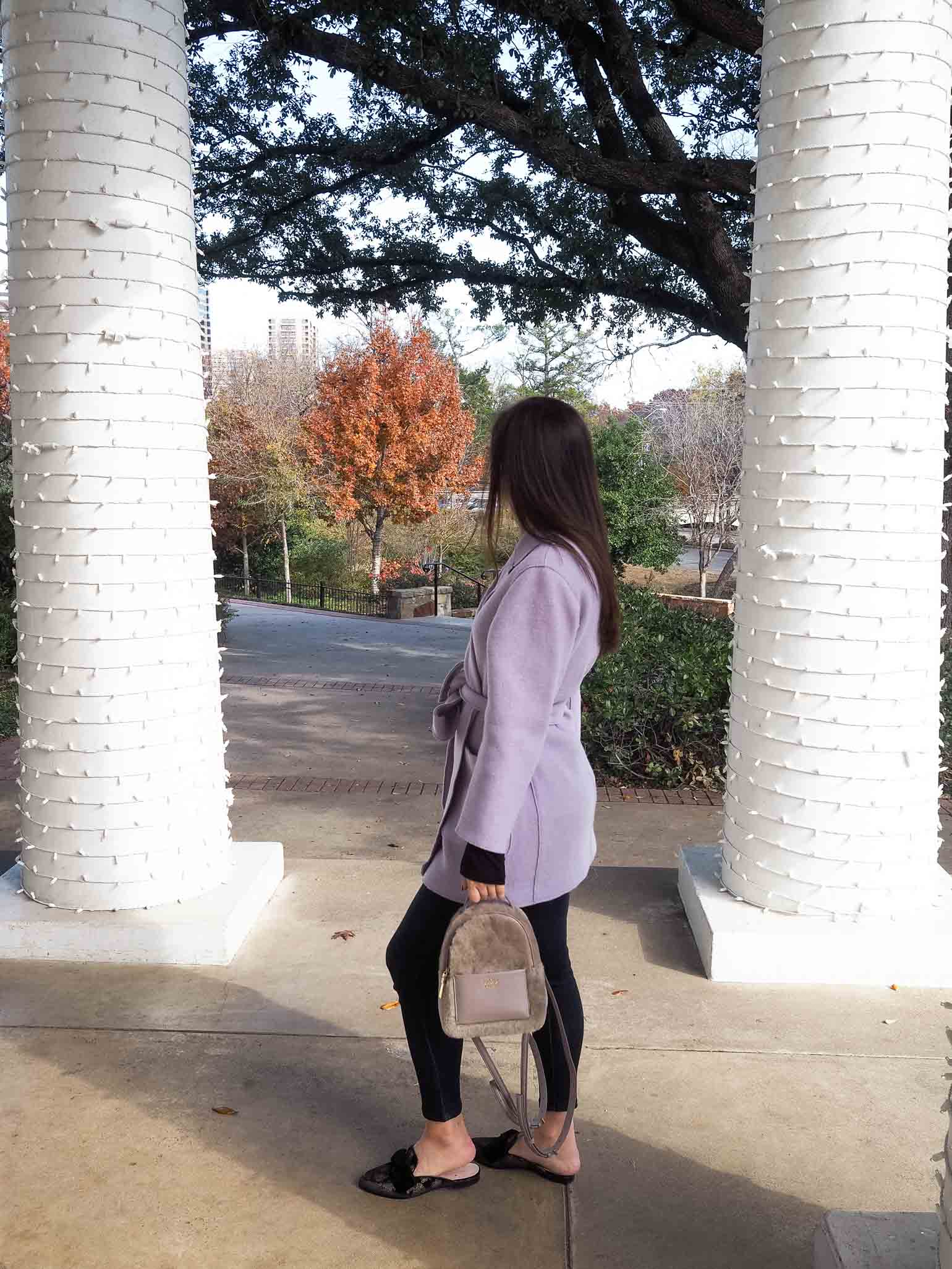 Cristina from The Brunette Nomad, Dallas fashion blogger, shows how to style this Kate Spade mini backpack 