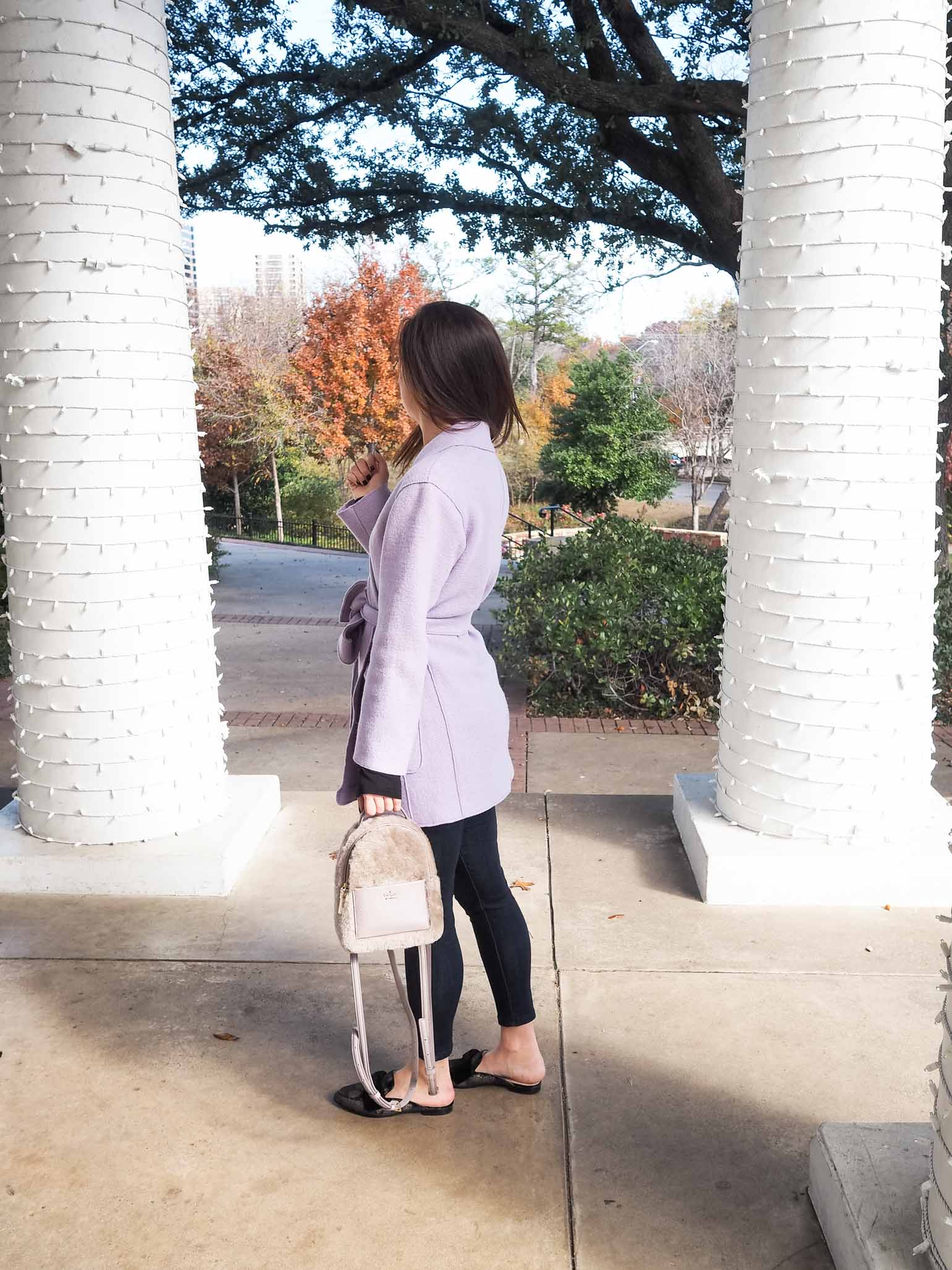 Cristina from The Brunette Nomad, Dallas fashion blogger, shows how to style this Kate Spade mini backpack 