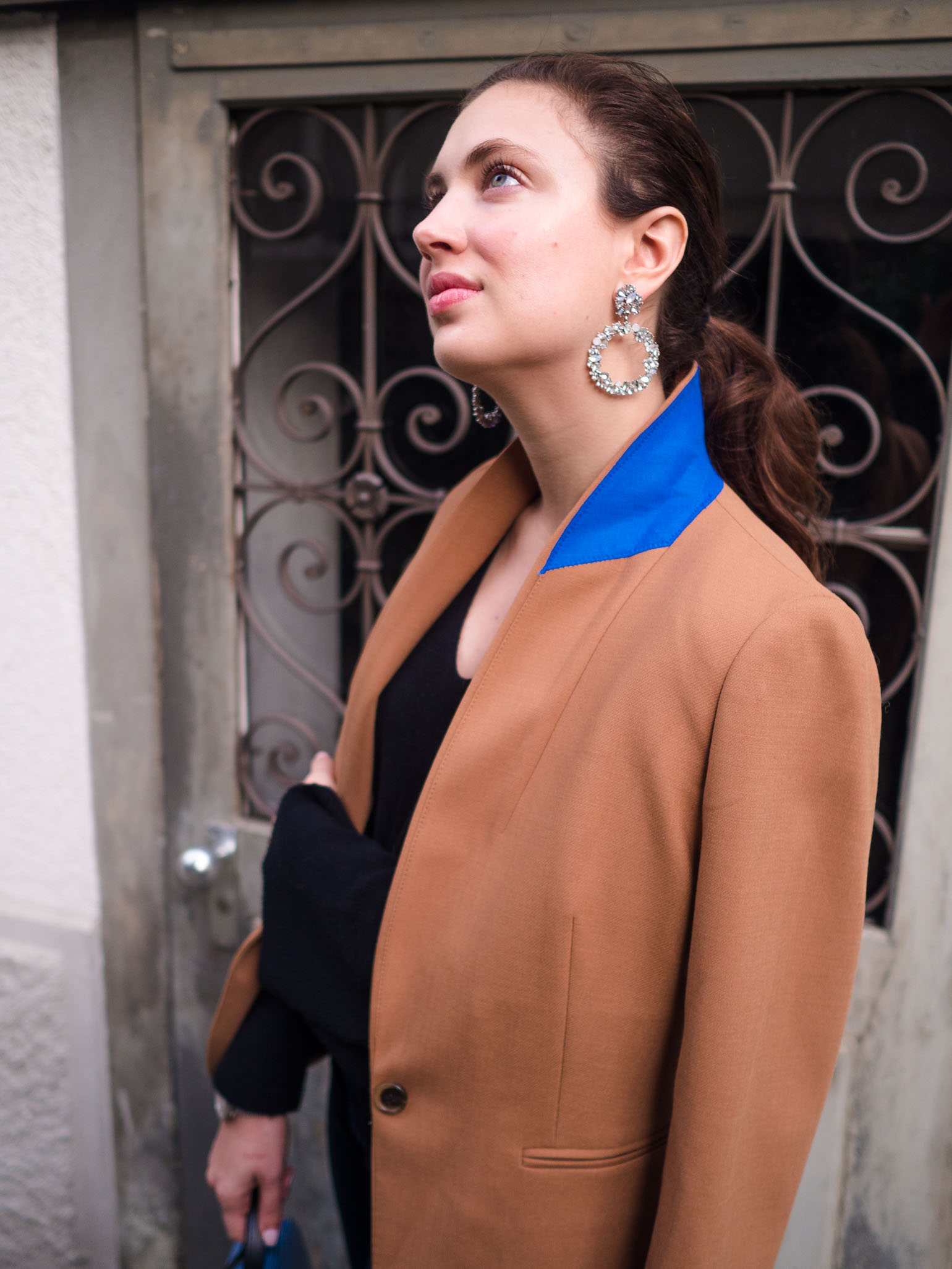 Cristina from The Brunette Nomad, Dallas and Swiss based fashion blogger, shares how to look instantly chic this season with a J.Crew camel blazer