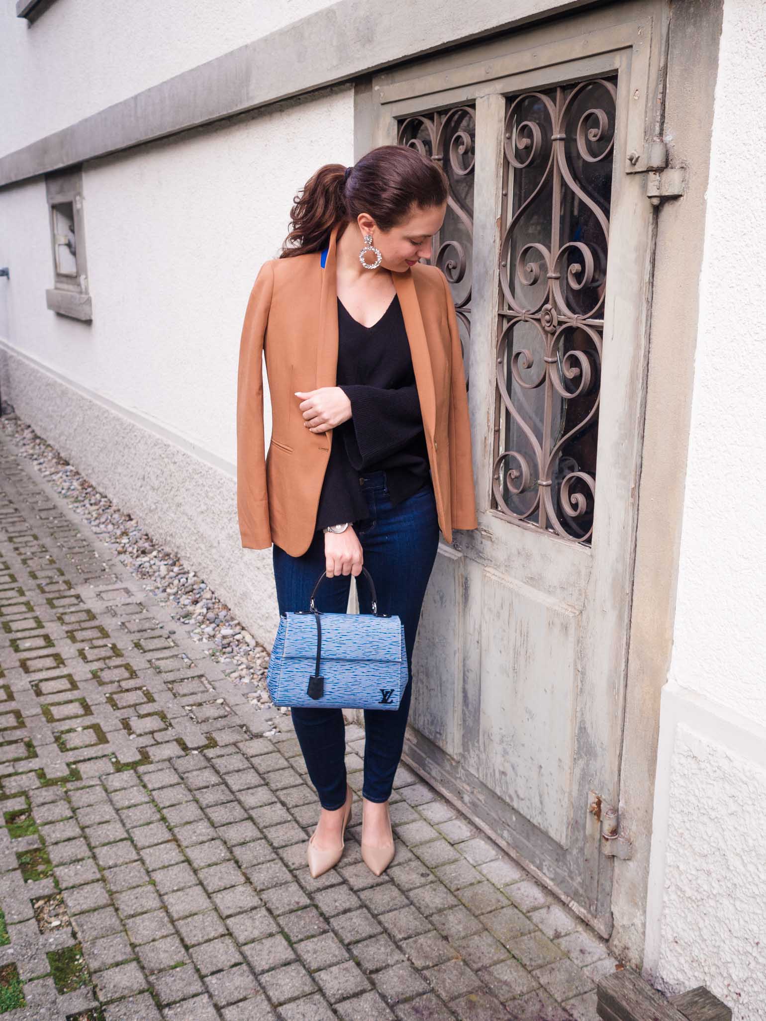 Cristina from The Brunette Nomad, Dallas and Swiss based fashion blogger, shares how to look instantly chic this season with a J.Crew camel blazer