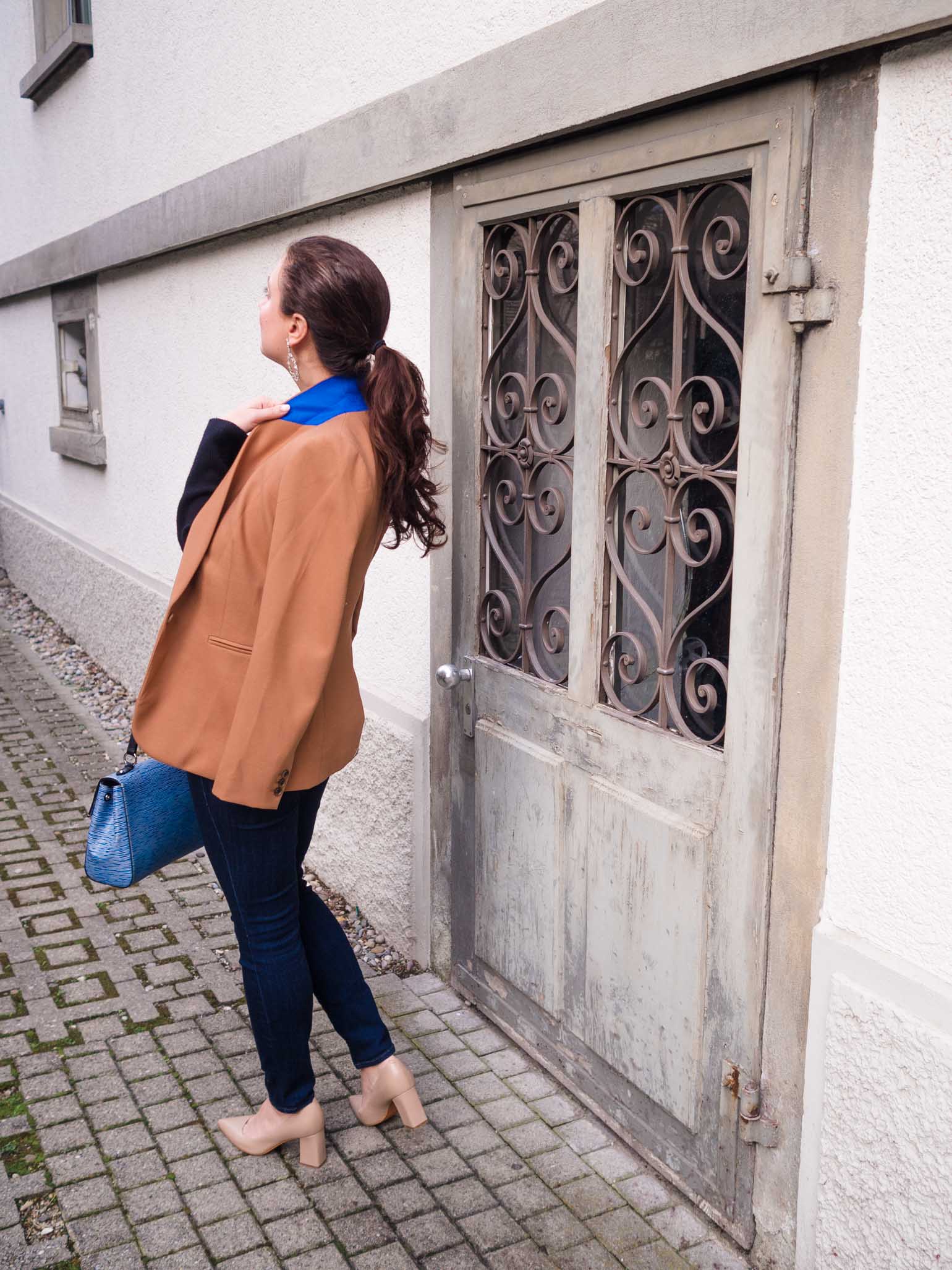 Cristina from The Brunette Nomad, Dallas and Swiss based fashion blogger, shares how to look instantly chic this season with a J.Crew camel blazer