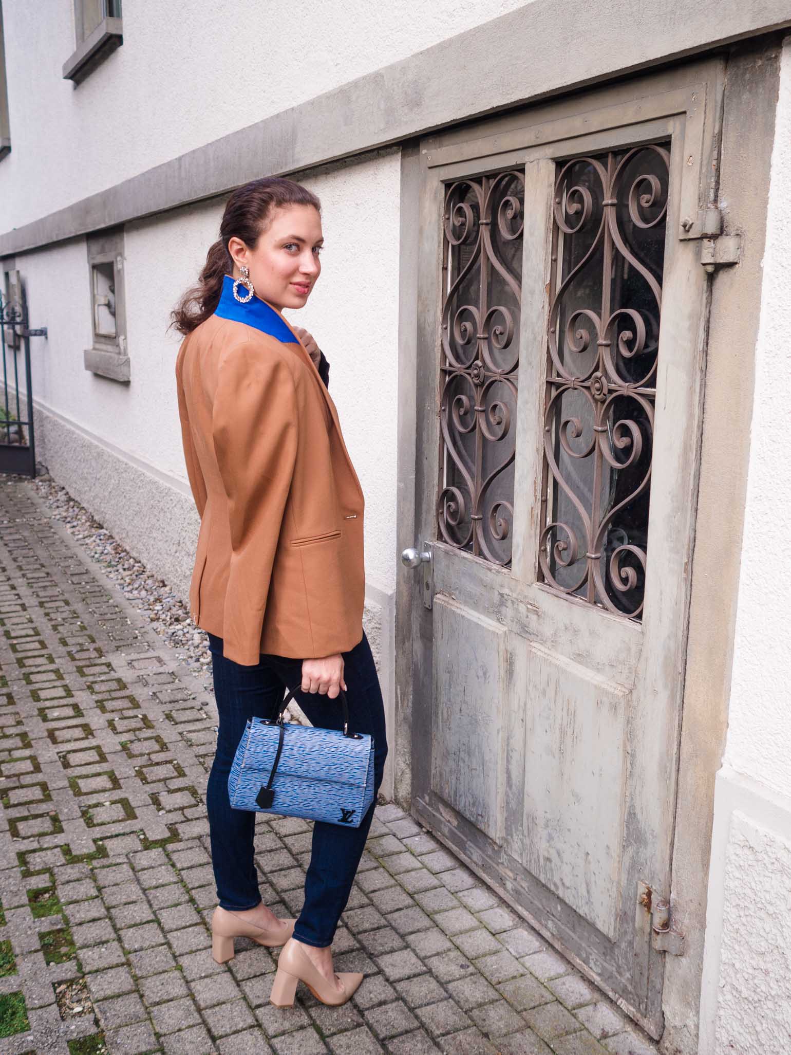 Cristina from The Brunette Nomad, Dallas and Swiss based fashion blogger, shares how to look instantly chic this season with a J.Crew camel blazer