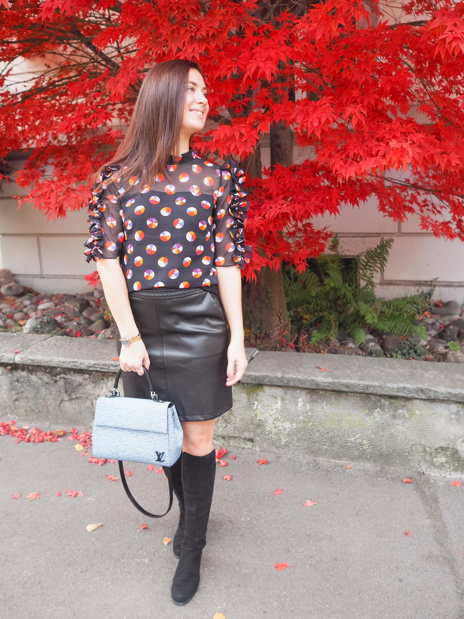 Holiday Party Outfit: Leather Skirt & Statement Blouse - The Brunette Nomad